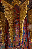 Wat Xieng Thong temple in Luang Prabang, Laos. the Ho Tai, the library. Detail of the console of the roof. 